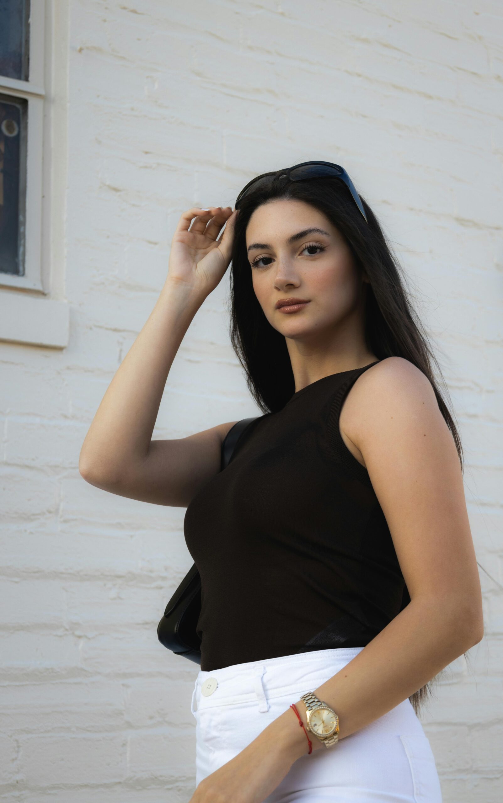 A 25-year-old woman with black hair